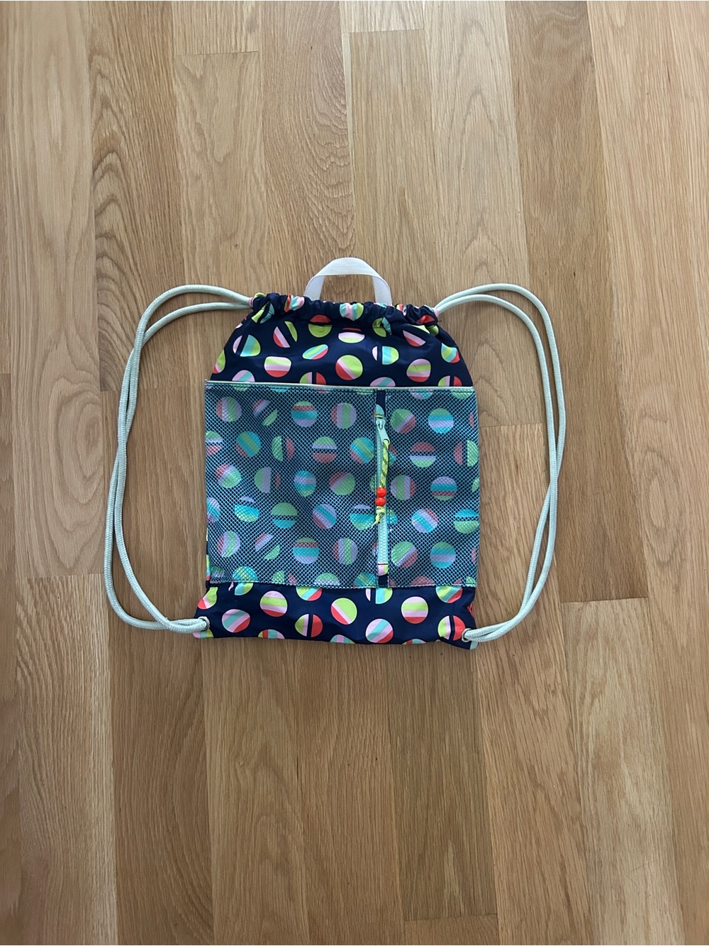 Kids Navy Drawstring Beach Backpack with Multicolor Beach Ball Print